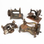 A collection of 4 miniature sewing machines. (L:20 x W:40 x H:25 cm)