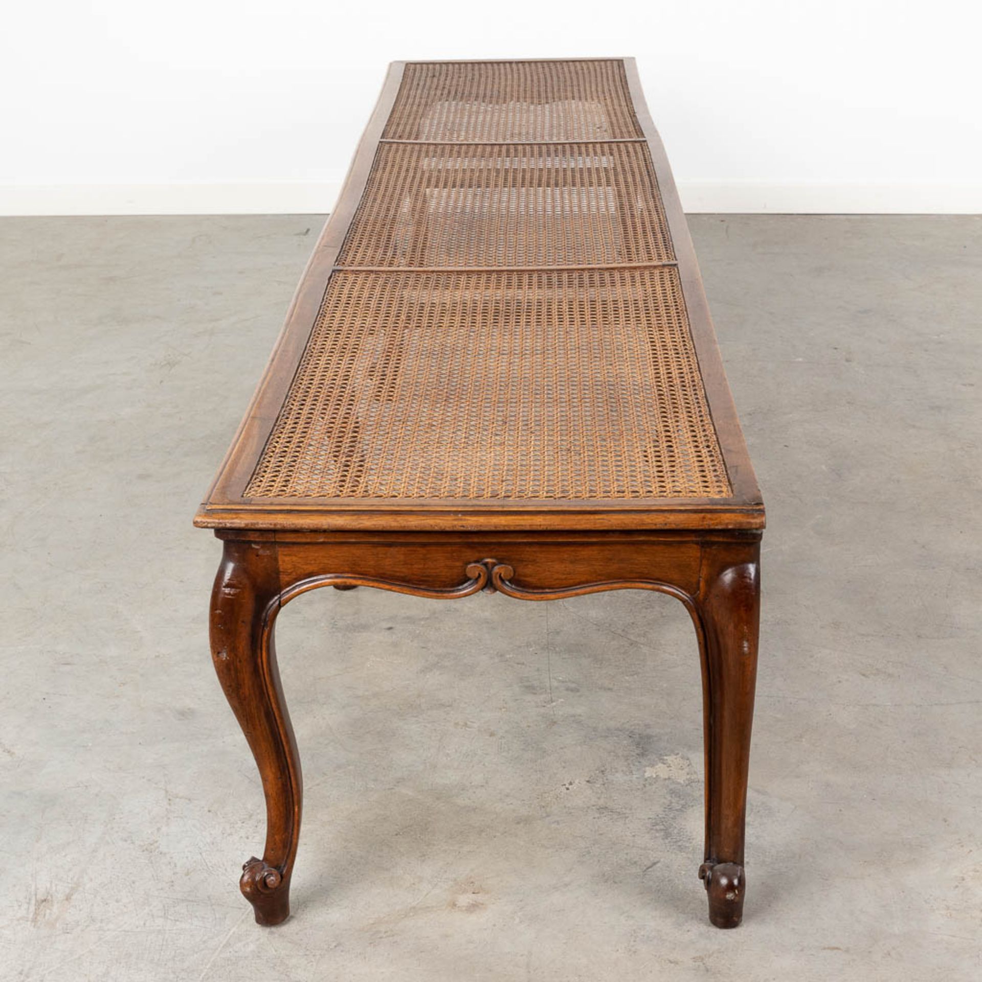 A long bench made of sculptured wood in Louis XV style finished with caning. (L:48 x W:218 x H:44 c - Image 6 of 13