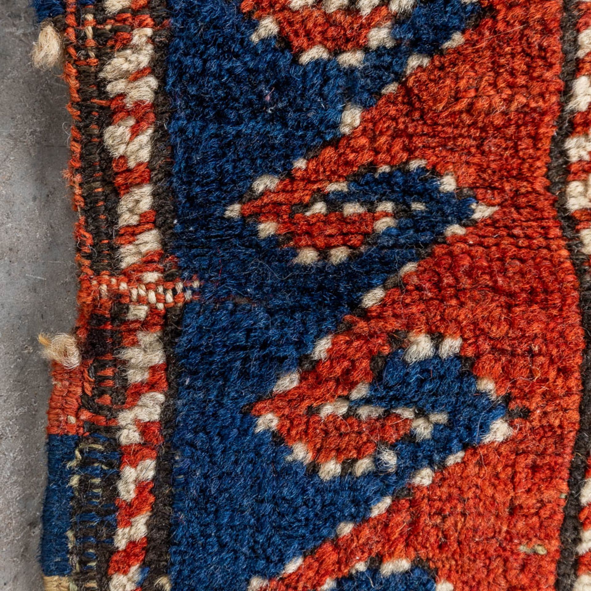 An oriental hand-made carpet. Kazak Caucasian. (L:175 x W:122 cm) - Image 9 of 9