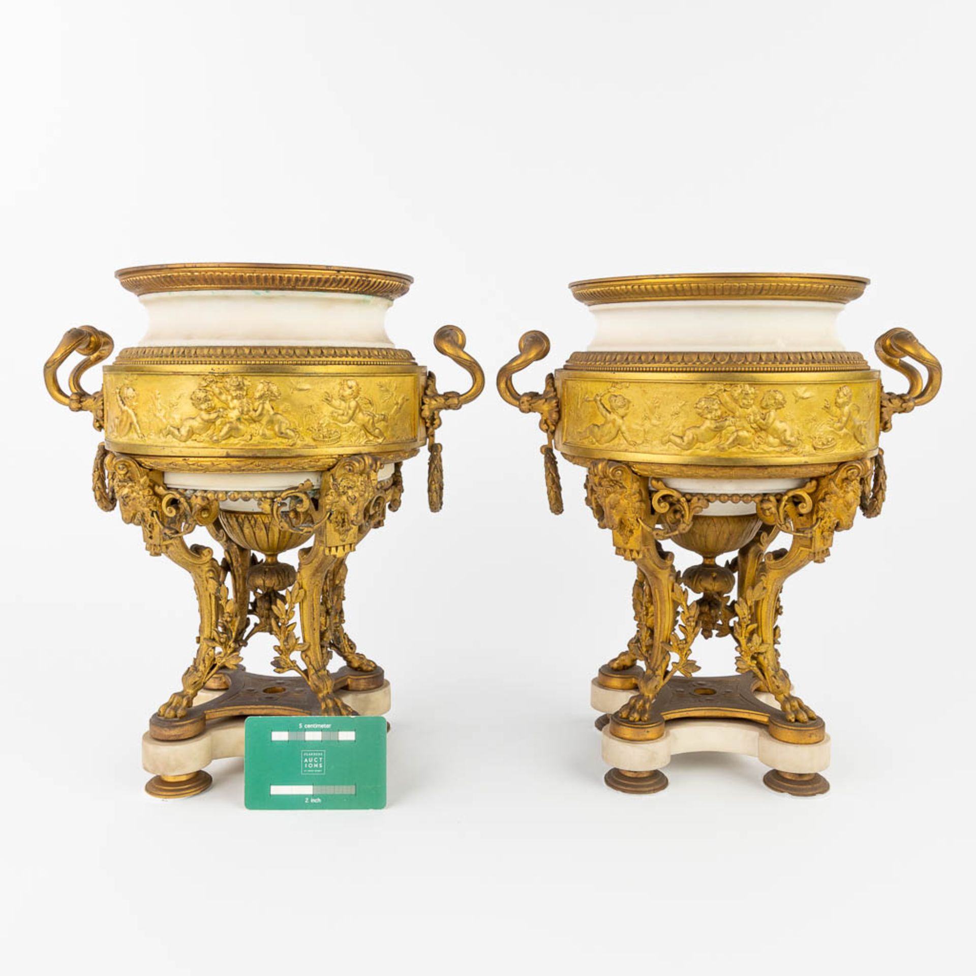 A pair of urns, made of gilt bronze and white Carrara marble in Louis XVI style. France, 19th C. (H: - Image 3 of 17