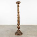 An antique wood sculptured stand or candlestick, decorated with grape vines. (H:152 cm)
