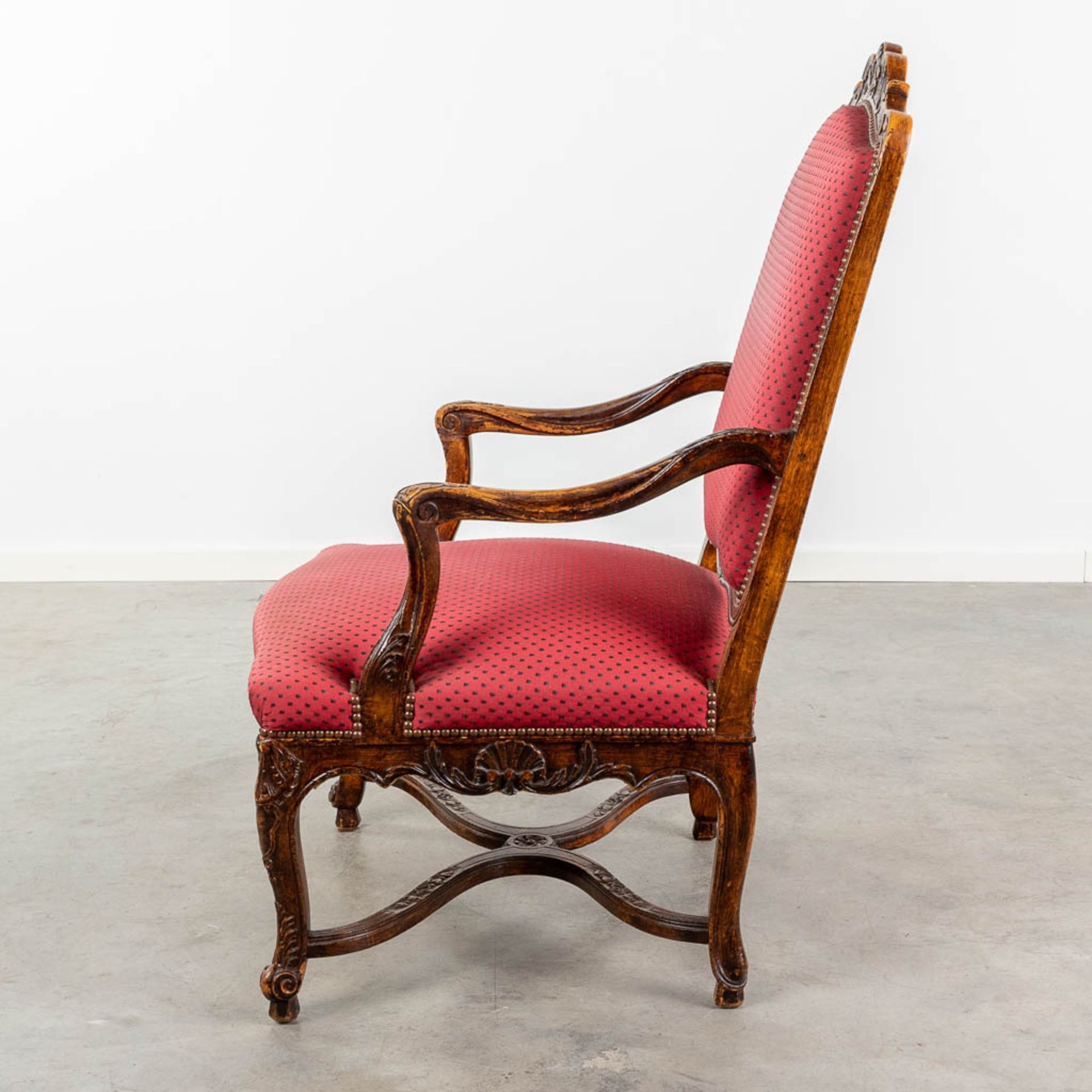 An armchair finished with red fabric and wood sculptures in Louis XV style. (L:73 x W:72 x H:108 cm - Image 5 of 13