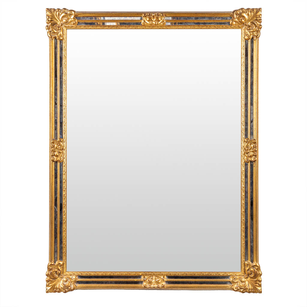 Deknudt, a gold-plated mirror with fumŽ glass rims. (W:88 x H:118 cm)