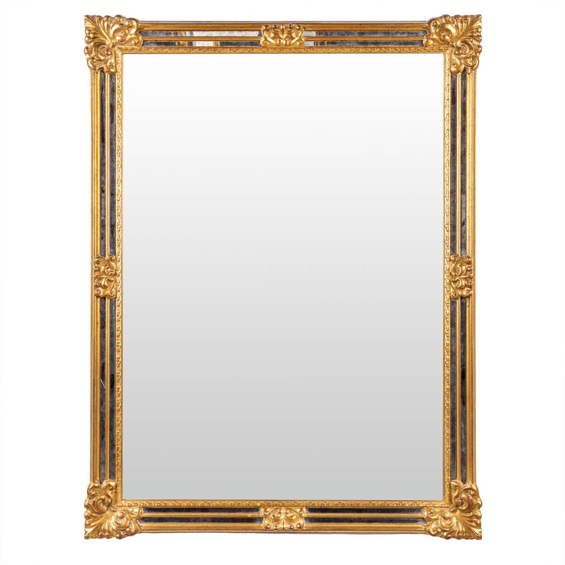 Deknudt, a gold-plated mirror with fumŽ glass rims. (W:88 x H:118 cm)