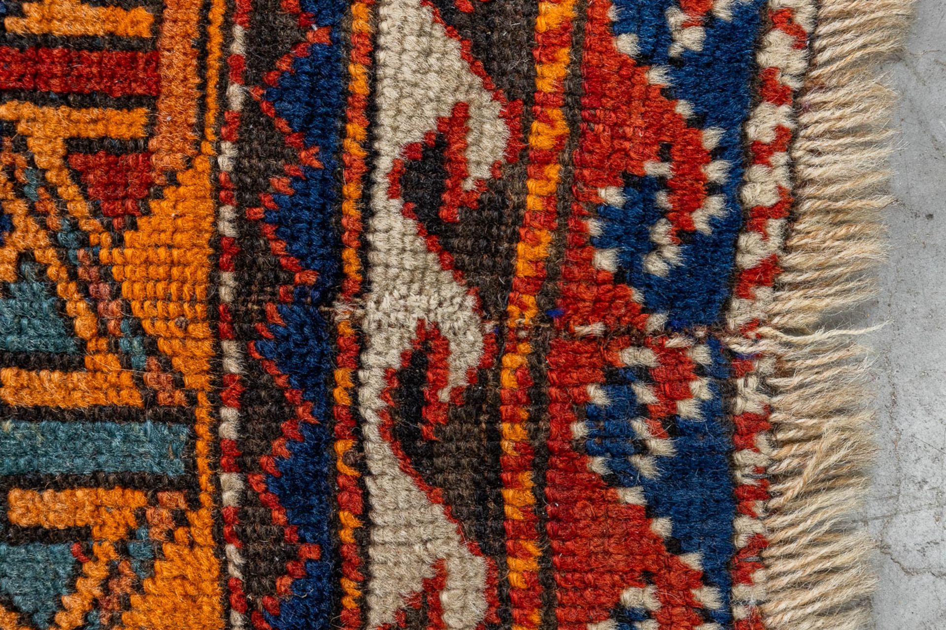 An oriental hand-made carpet. Kazak Caucasian. (L:175 x W:122 cm) - Image 5 of 9