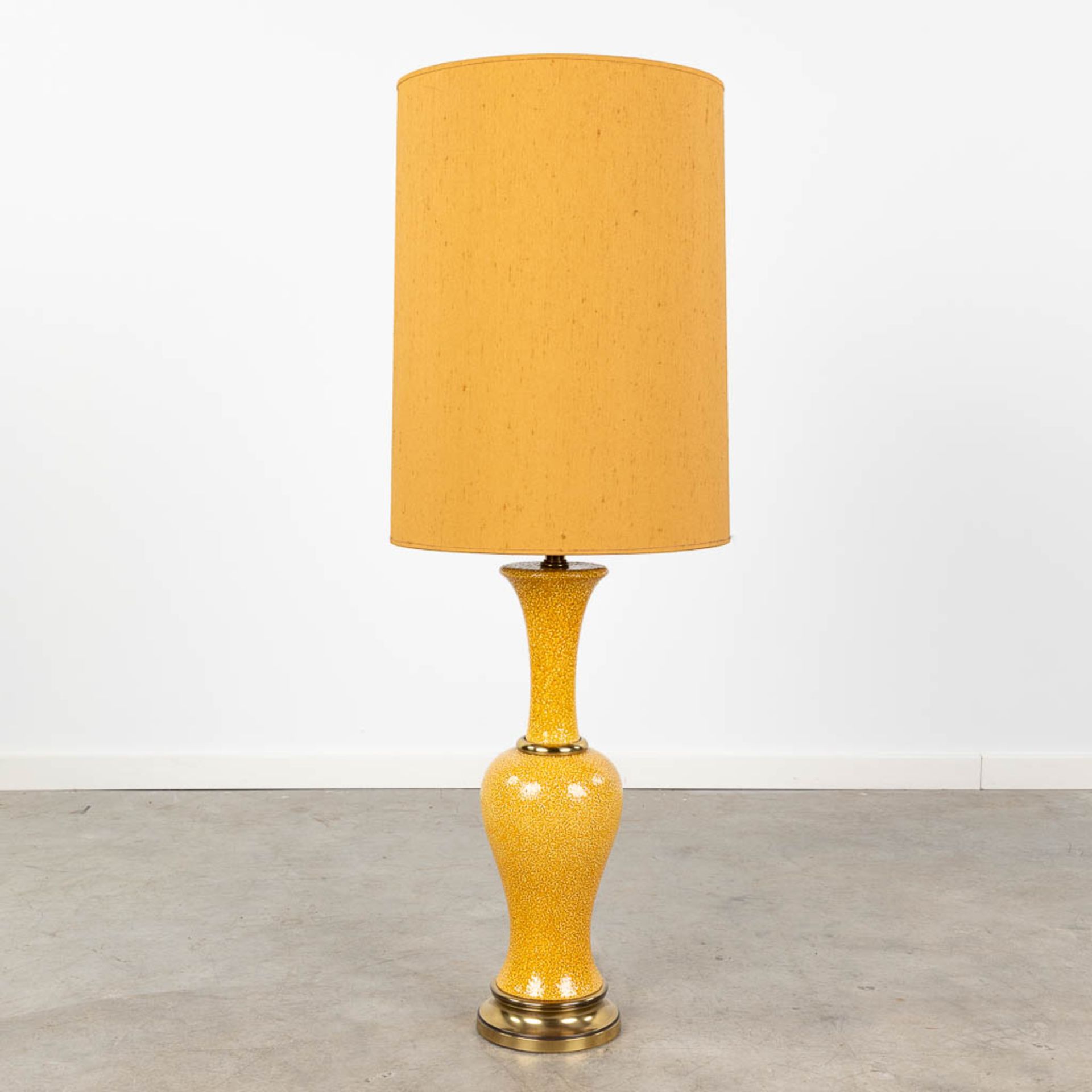 A vintage table lamp made of ceramics with bronze and an orange shade. (H:114 cm)
