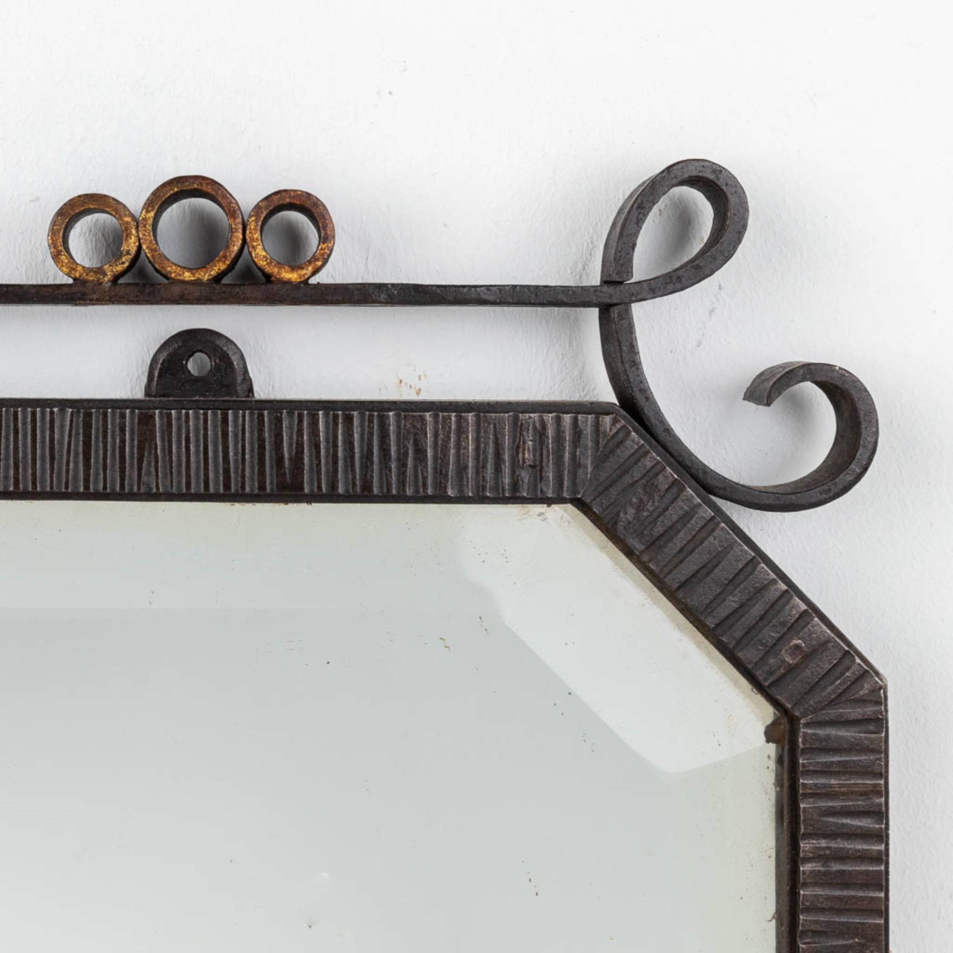 A mirror with a wrought iron frame, circa 1920. (W:80 x H:60 cm) - Image 4 of 7