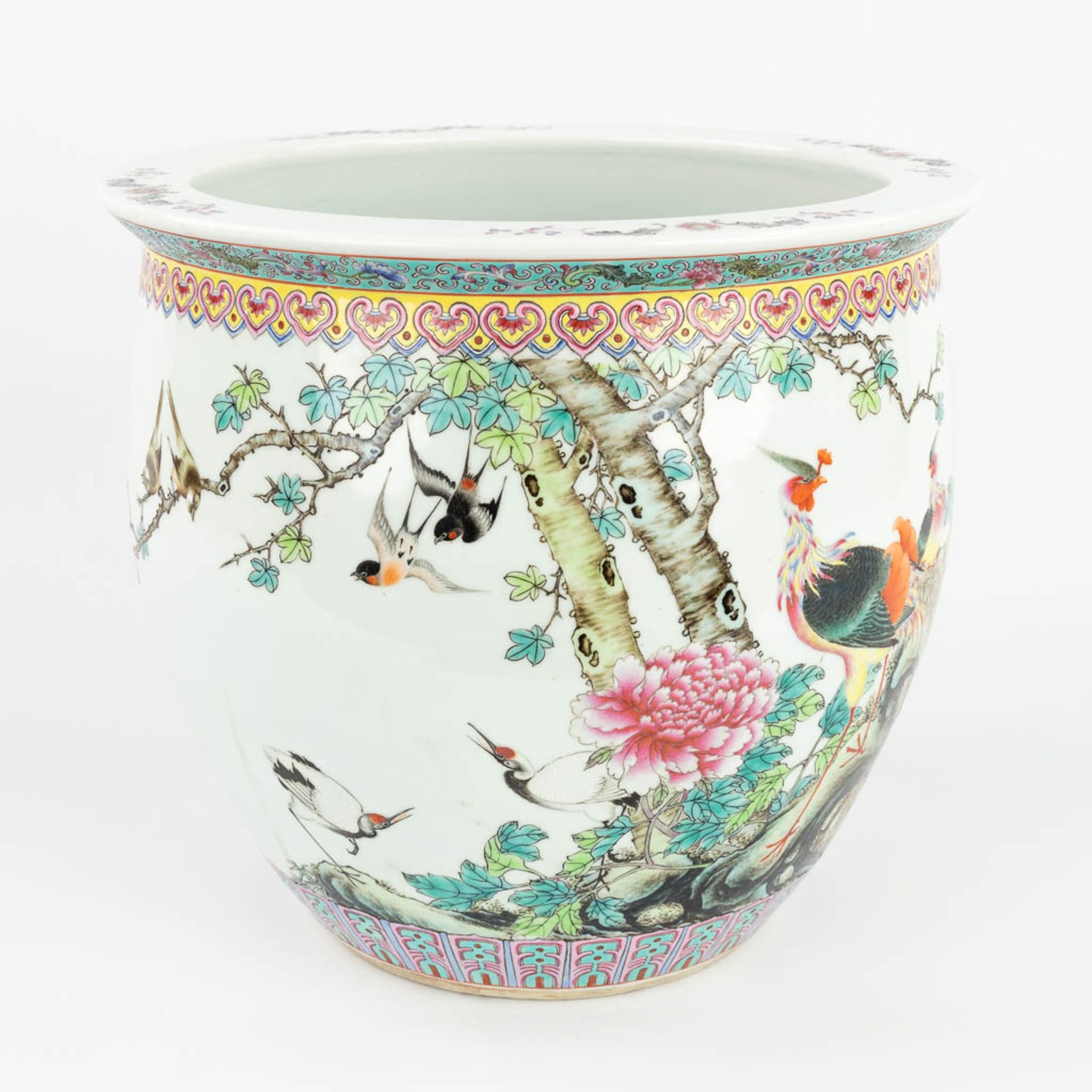 A Chinese cache pot made of porcelain and decorated with phoenixes. 20th C. (H:28 x D:31 cm) - Image 3 of 16