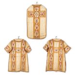 A Roman Chasuble and two Dalmatics, decorated with thick gold thread and embroidery in floral motive