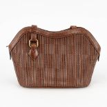 Delvaux 'Toile De Cuir' handbag made of brown leather. (W: 33 x H: 21 cm)