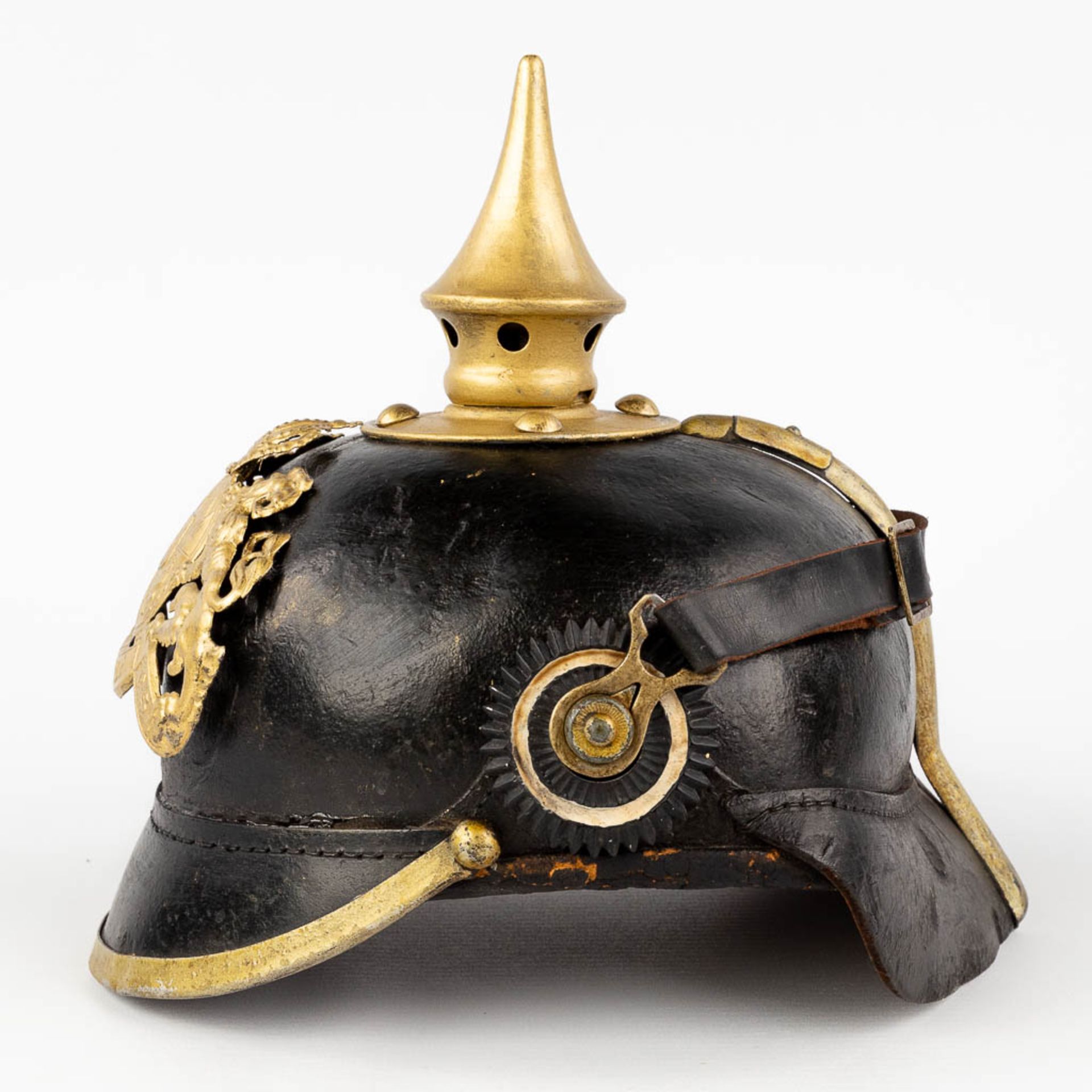 A German 'Pickelhaube' spiked helmet, made of leather and copper, 19th century. (L: 22,5 x W: 19 x H - Image 4 of 14