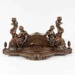 An antique mantle piece, decorated with female figurines and Phoenixes, patinated bronze. 19th C. (L
