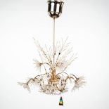 A vintage chandelier made of cut glass and marked Strass Swarovski. (W: 55 x H: 80 cm)