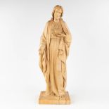 A wood-sculptured figurine of Jesus Christ with a Sacred Heart. The first half of the 20th century.