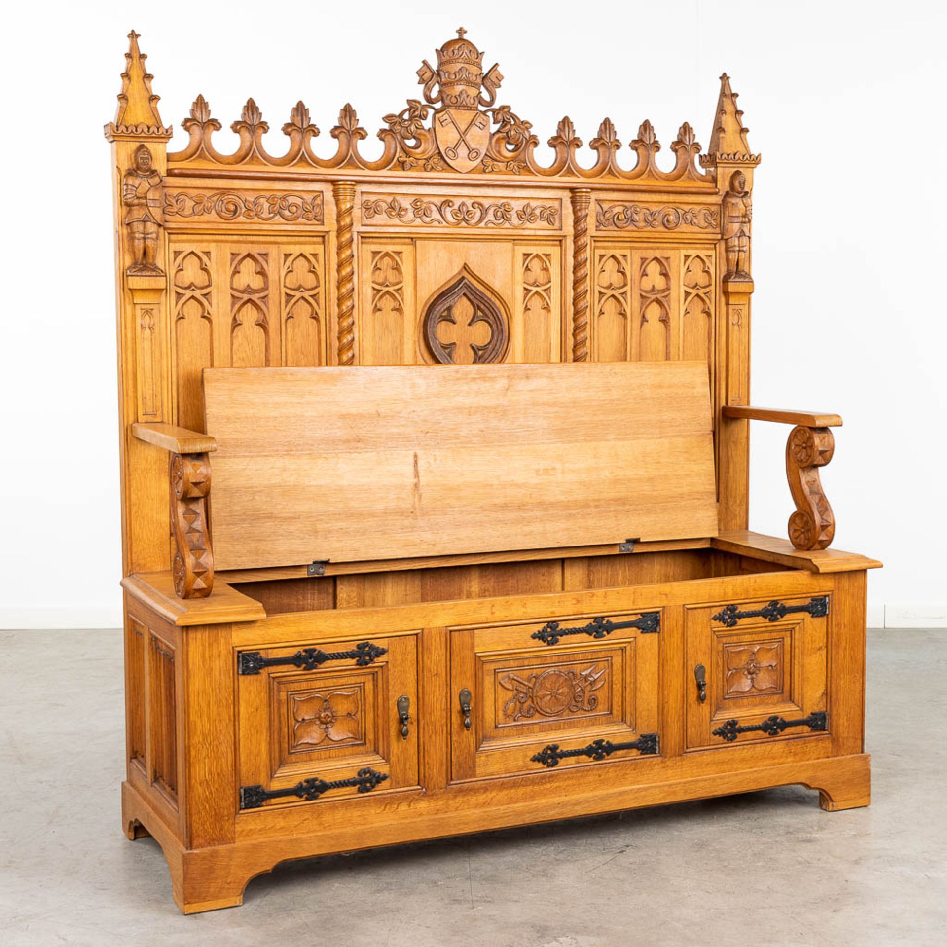 A large and antique bench finished with wood sculptured in a Gothic Revival style. 20th century. (L: - Image 3 of 16