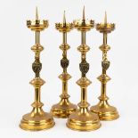A set of 4 Church candlesticks made of bronze in gothic revival style. (H: 50 cm)