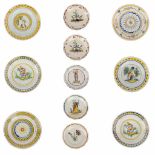 A collection of 11 plates made in Brussels and France. 18th century. (D: 31 cm)