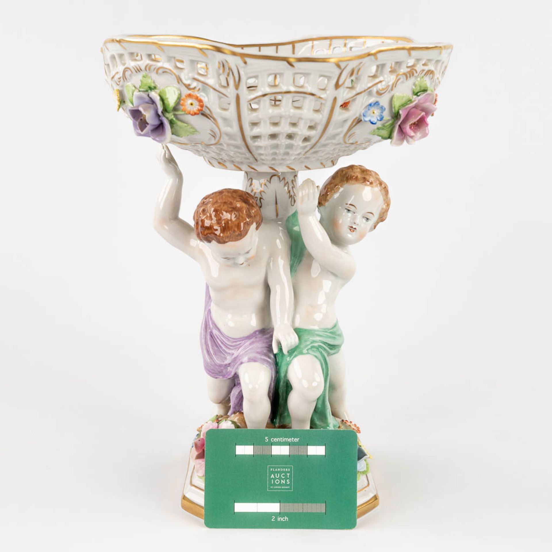 Plaue Schierholz 1817, a porcelain tazza decorated with boys holding up a basket. 20th C. (L: 19 x W - Image 2 of 22