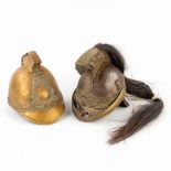 Alexis Godillot, an antique French cuirassier helmet, added a French Firefighter's helmet. (L: 27 x