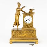 An antique mantle clock, made of bronze during empire period. 19th C. (L: 13,5 x W: 31 x H: 44 cm)