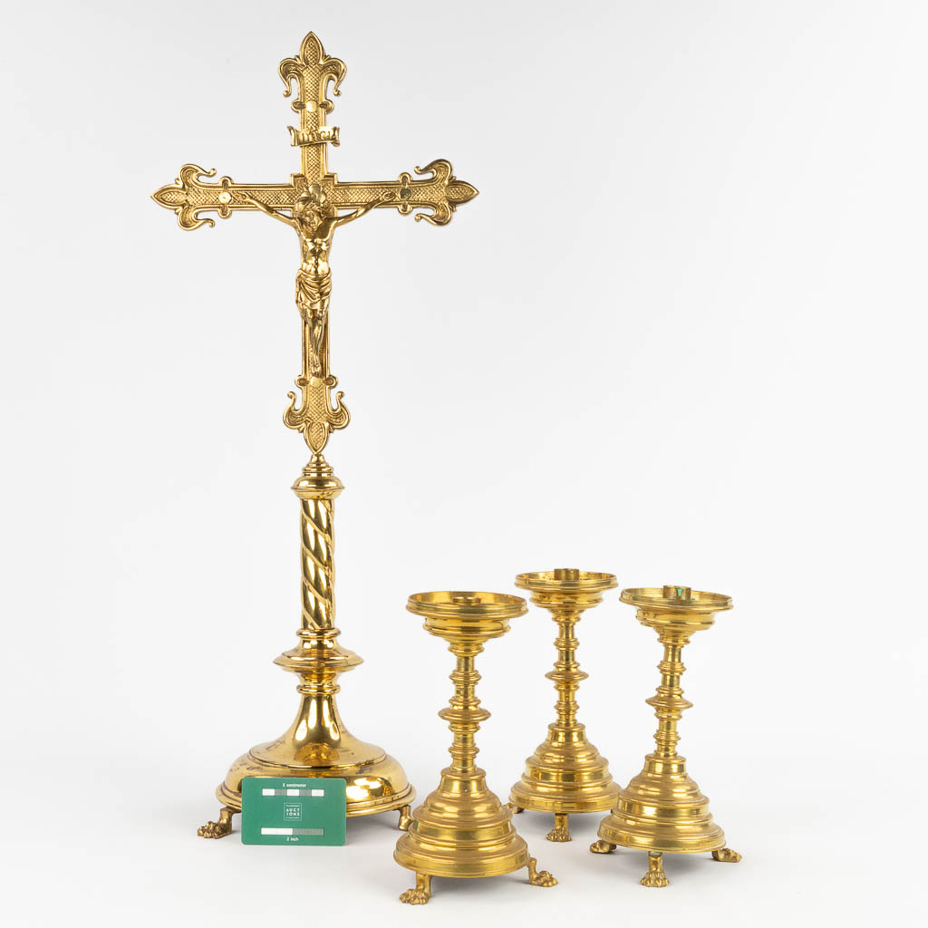 An antique bronze crucifix and 3 matching candelabra, standing on claw feet. 19th C. (W: 28 x H: 68 - Image 2 of 17