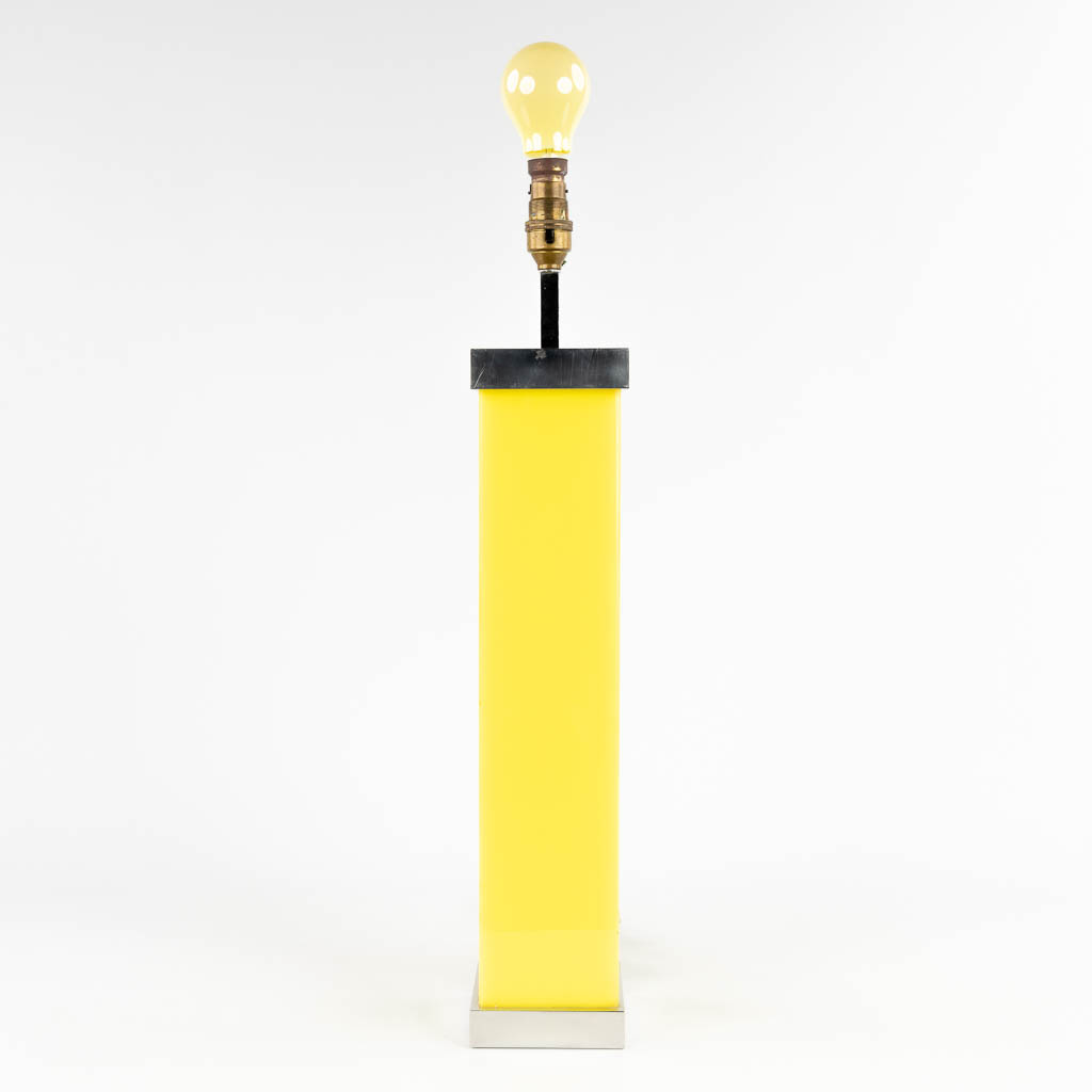 A vintage table lamp, aluminium and yellow acrylic, circa 1970. (L: 10 x W: 10 x H: 51 cm)