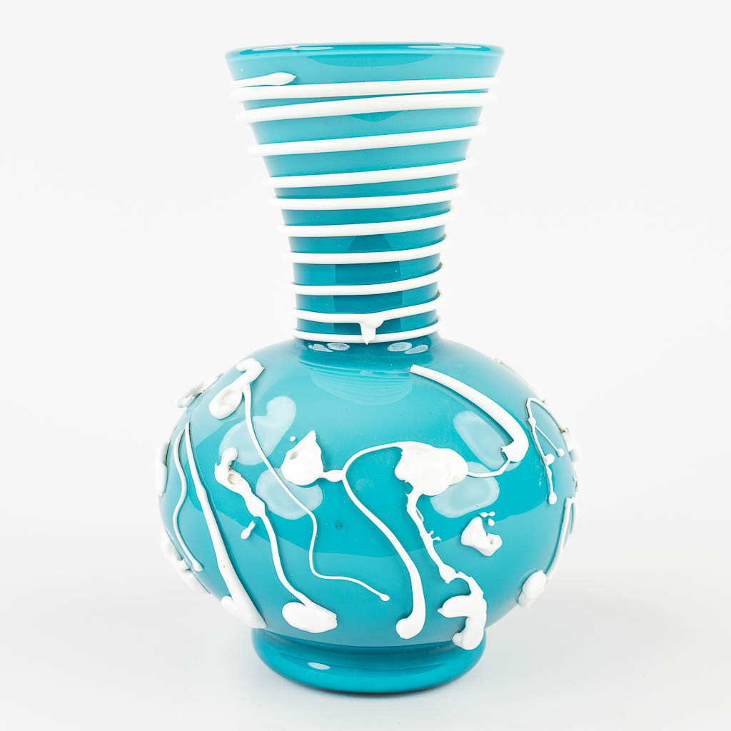 A vase made of glass with drip decor, Murano, Italy. (W: 16 x H: 23,5 cm)
