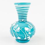 A vase made of glass with drip decor, Murano, Italy. (W: 16 x H: 23,5 cm)