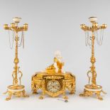Henry PICARD (XIX) A three-piece garniture clock and candelabra, gilt bronze with a Carrara marble.
