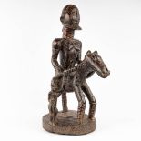 Dogon, an African statue of a rider on a horseback. (L: 50 x W: 31 x H: 82 cm)