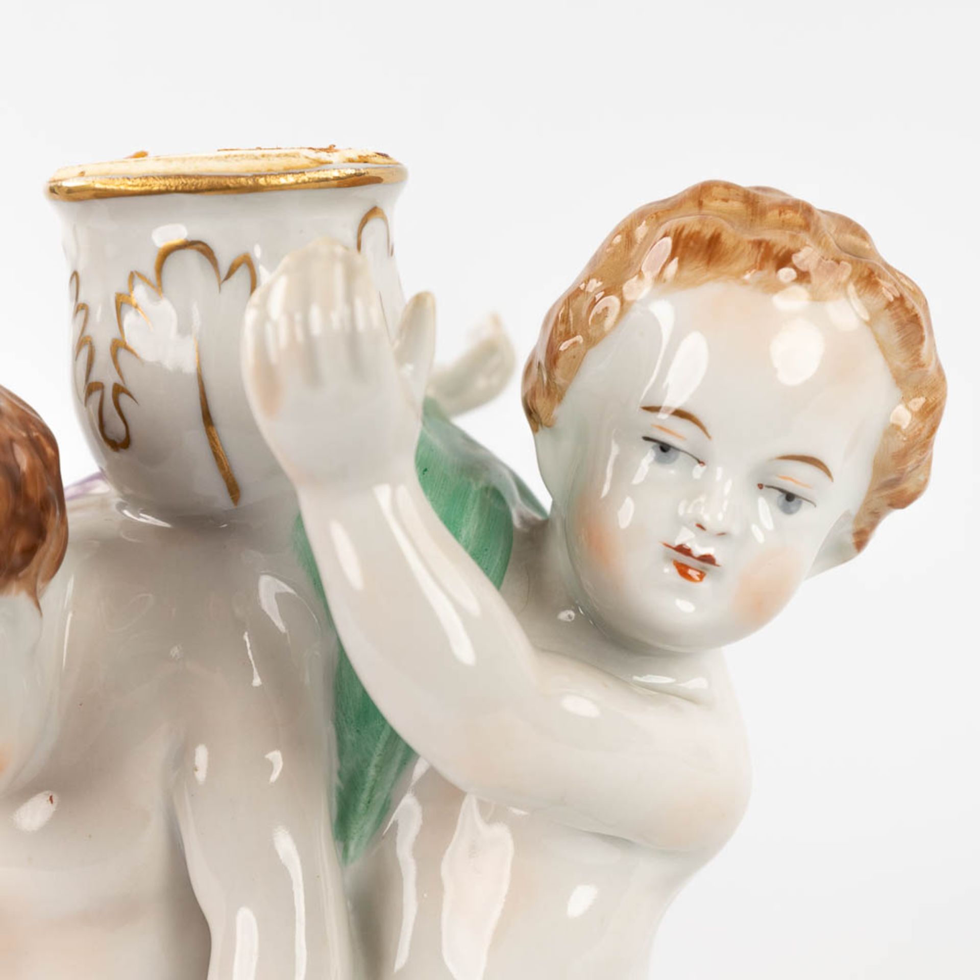 Plaue Schierholz 1817, a porcelain tazza decorated with boys holding up a basket. 20th C. (L: 19 x W - Image 11 of 22
