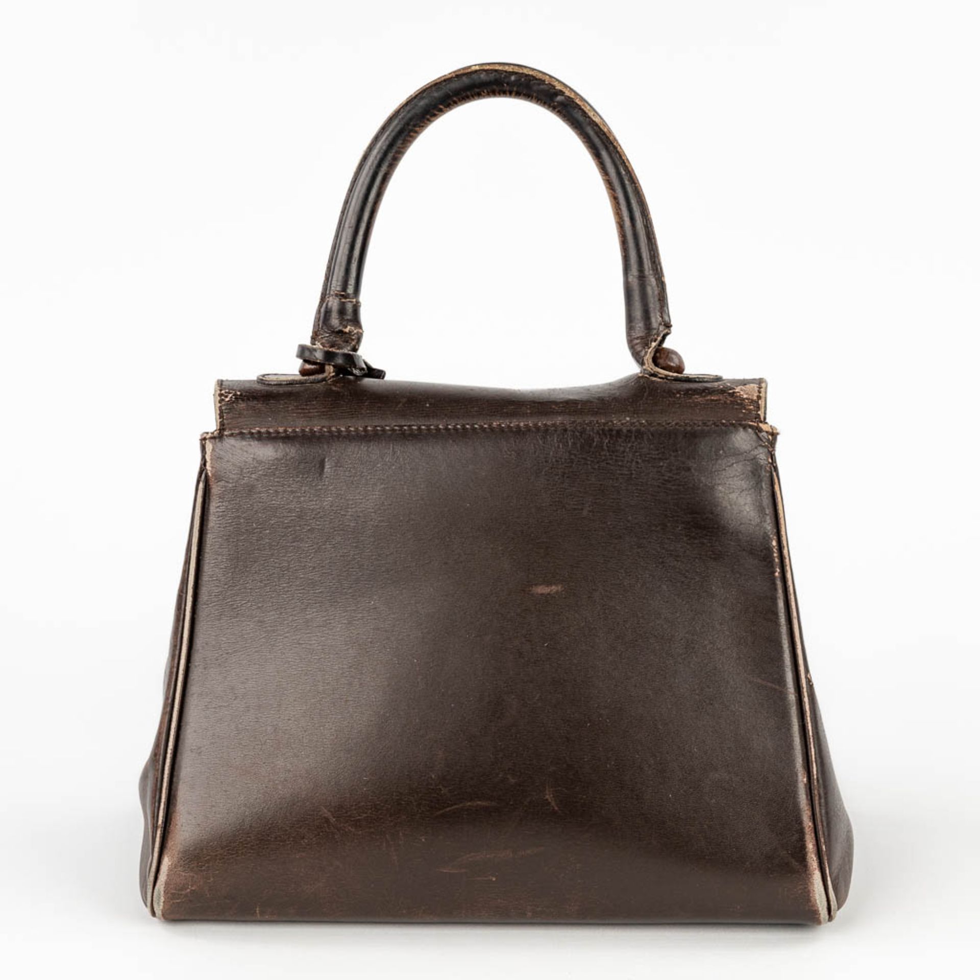 Delvaux Brillant PM, a handbag made of dark brown leather. Circa 1950. (W: 26 x H: 30 cm) - Image 5 of 19