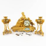 A mantle clock and a pair of cassolettes, gilt bronze. 19th C. (W: 38 x H: 28 cm)