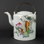 A Chinese teapot with image of an Immortal, children and a peach. 19th C. (L: 12 x W: 17 x H: 14 cm)