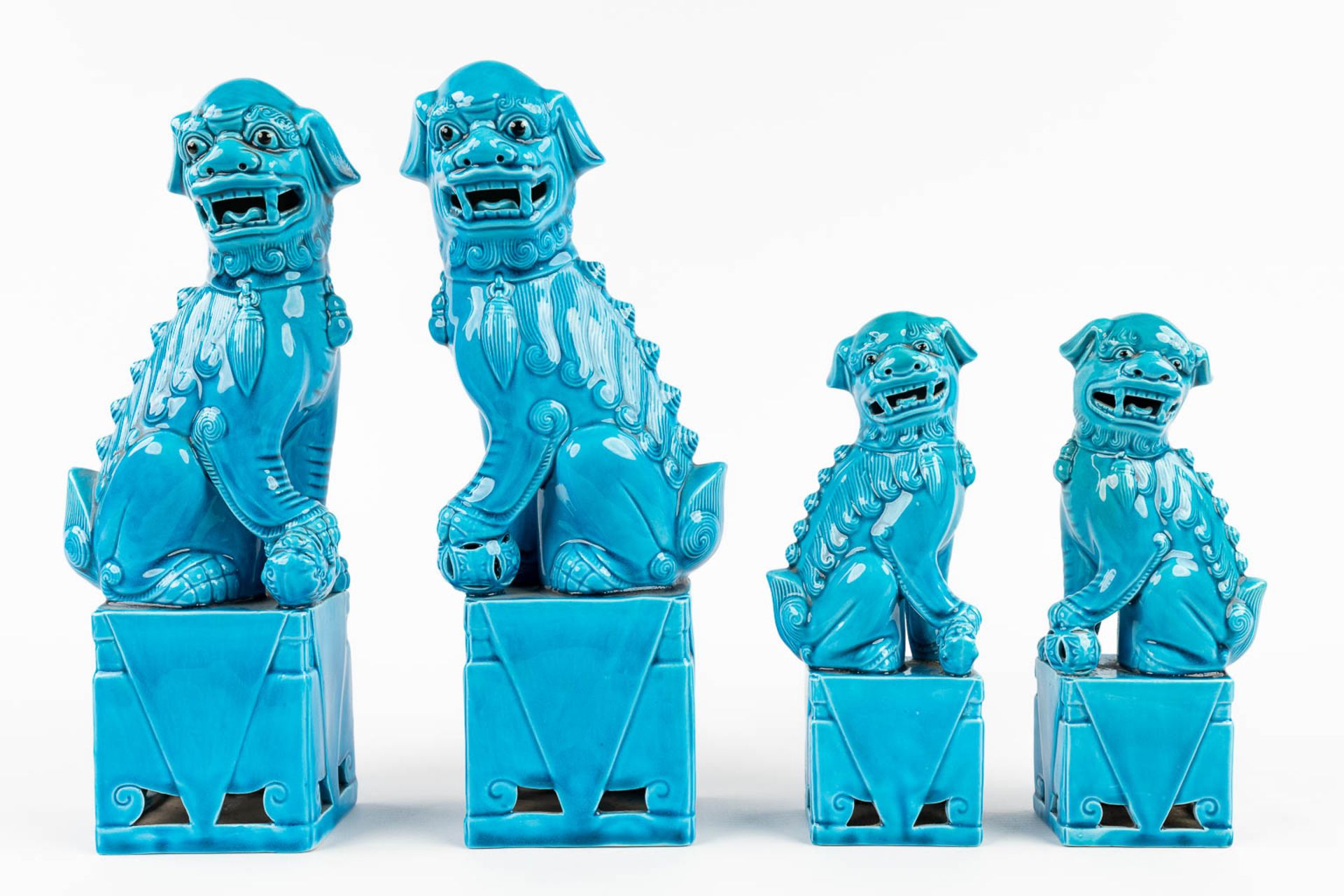 A collection of 2 pairs of Foo dogs, made of blue glazed ceramics. 20th C. (L: 8 x W: 11 x H: 30 cm) - Image 3 of 12