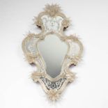 A richly decorated mirror, Venetian Glass. Murano, Italy. Circa 1950. (W: 70 x H: 125 cm)