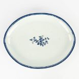A large Chinese serving plate with blue-white flower decor. 19th/20th century. (L: 33 x W: 43 cm)