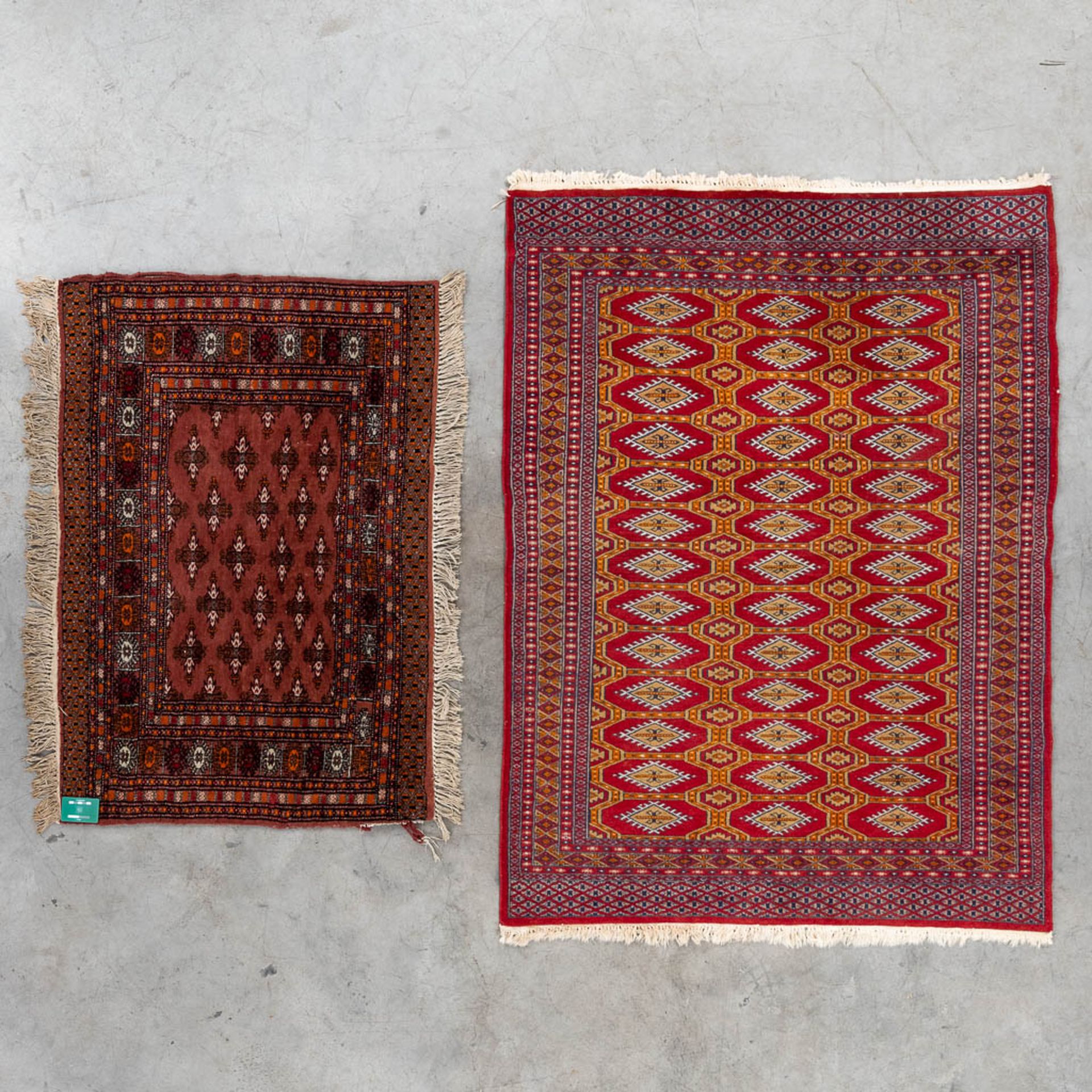 A set of 2 Oriental hand-made carpets, Bokhara/Buchara. (125 x 87 cm)(124 x 170 cm). (L: 124 x W: 17 - Image 2 of 11