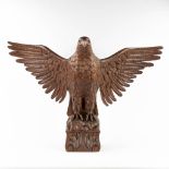 A large wood sculptured eagle, the second half of the 20th century. (W: 102 x H: 71 cm)