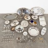 A collection of table accessories and serve ware, silver-plated metal and glass. (L: 31,5 x W: 46 cm