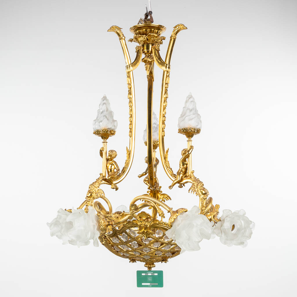 A chandelier made of gold-plated bronze, decorated with putti and glass in Louis XV style. Circa 195 - Image 2 of 13