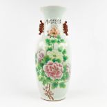 A Chinese vase with floral decor. 19th/20th C. (H: 59 x D: 23 cm)