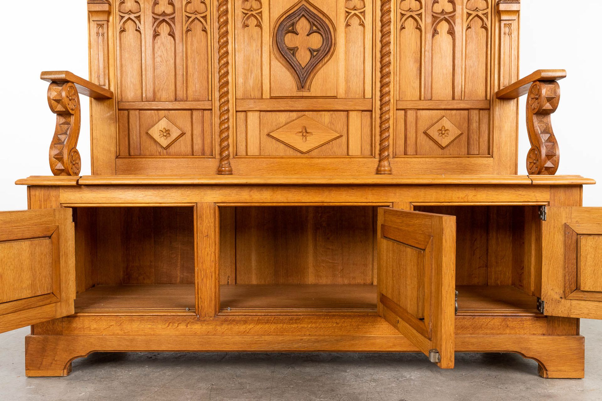 A large and antique bench finished with wood sculptured in a Gothic Revival style. 20th century. (L: - Image 15 of 16