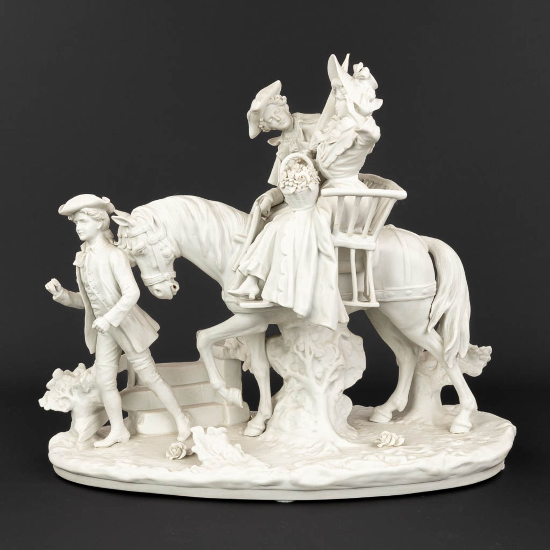 Scheibe Alsbach, Thuringe, a large bisque porcelain group 'Travelling on a horse'. (L: 20 x W: 40 x