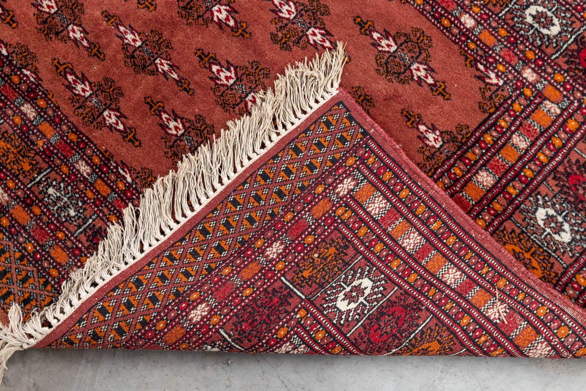 A set of 2 Oriental hand-made carpets, Bokhara/Buchara. (125 x 87 cm)(124 x 170 cm). (L: 124 x W: 17 - Image 6 of 11