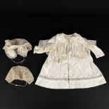 An antique baptism robe and two hats, lace, Belgium, late 19th early 20th century. (H: 50 cm)