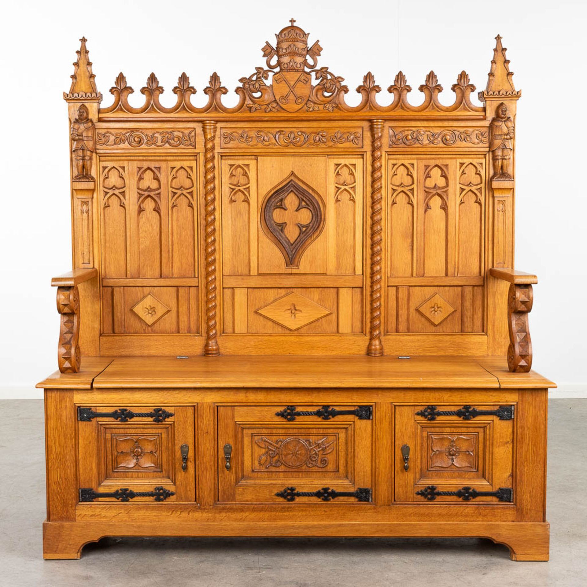 A large and antique bench finished with wood sculptured in a Gothic Revival style. 20th century. (L: - Image 4 of 16