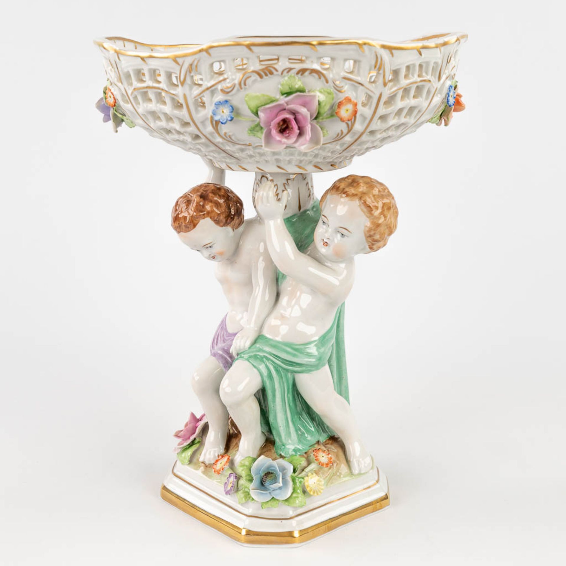 Plaue Schierholz 1817, a porcelain tazza decorated with boys holding up a basket. 20th C. (L: 19 x W - Image 3 of 22