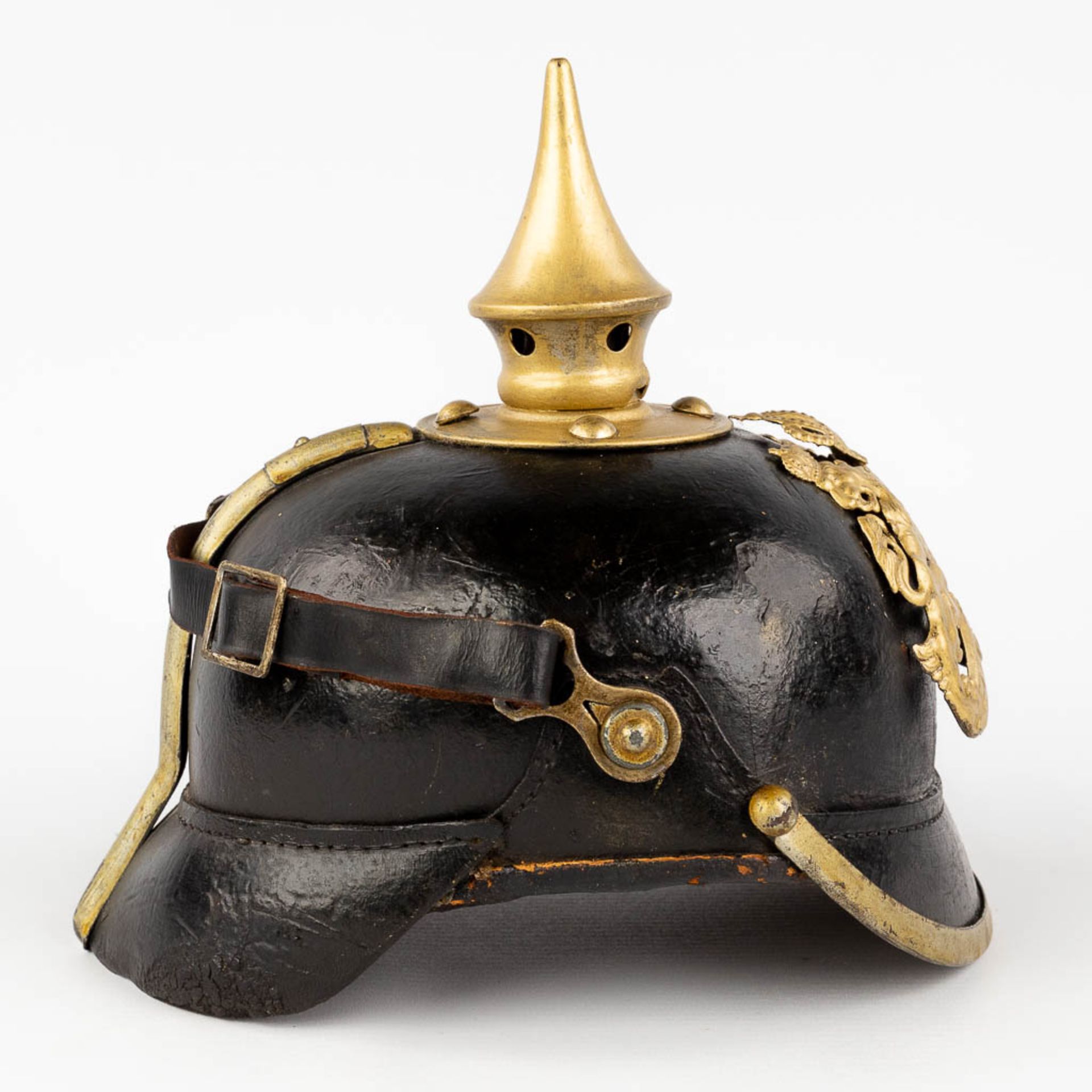 A German 'Pickelhaube' spiked helmet, made of leather and copper, 19th century. (L: 22,5 x W: 19 x H - Image 6 of 14