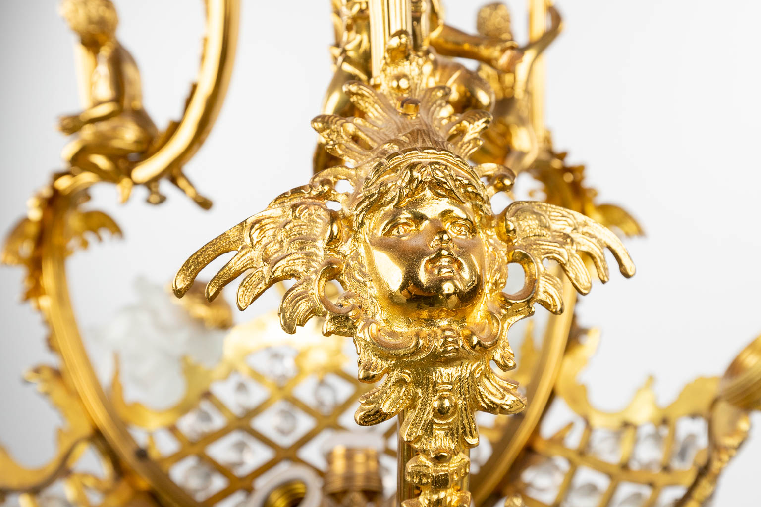 A chandelier made of gold-plated bronze, decorated with putti and glass in Louis XV style. Circa 195 - Image 7 of 13